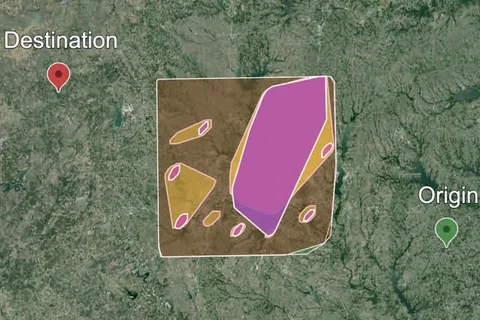 Satellite map of the Dallas Fort Worth area with wind hazard polygons between an origin and a destination
